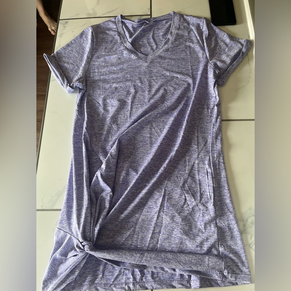 Size small tshirt purple. New, not sure of brand.